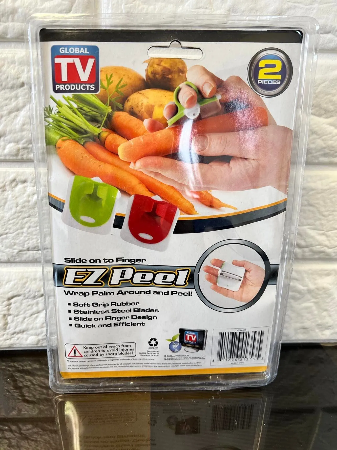 As Seen On TV, EZ Peel! Slide on to Finger, Wrap Palm Around and Peel!!