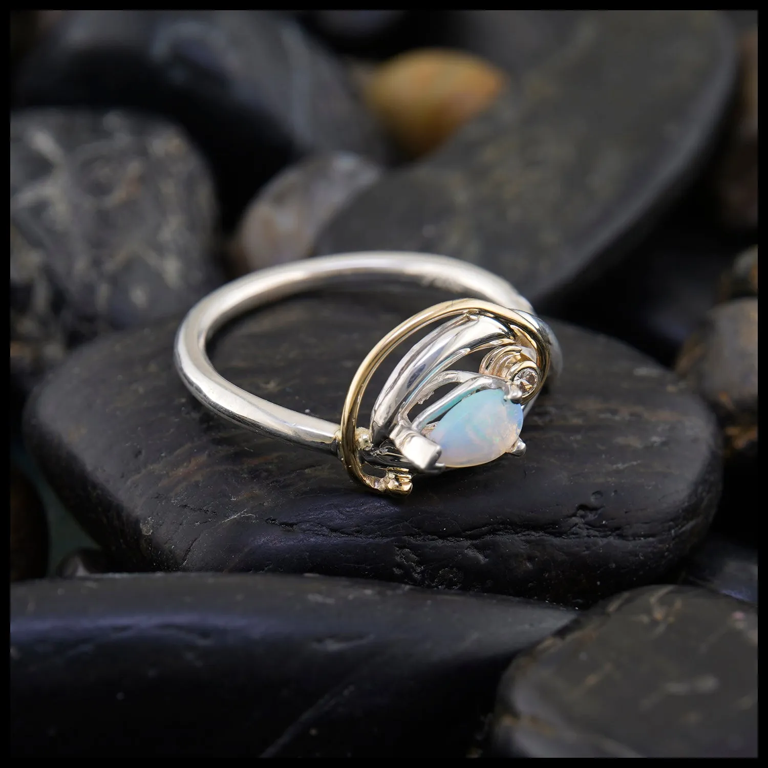 Elegant Diamond and Opal Ring