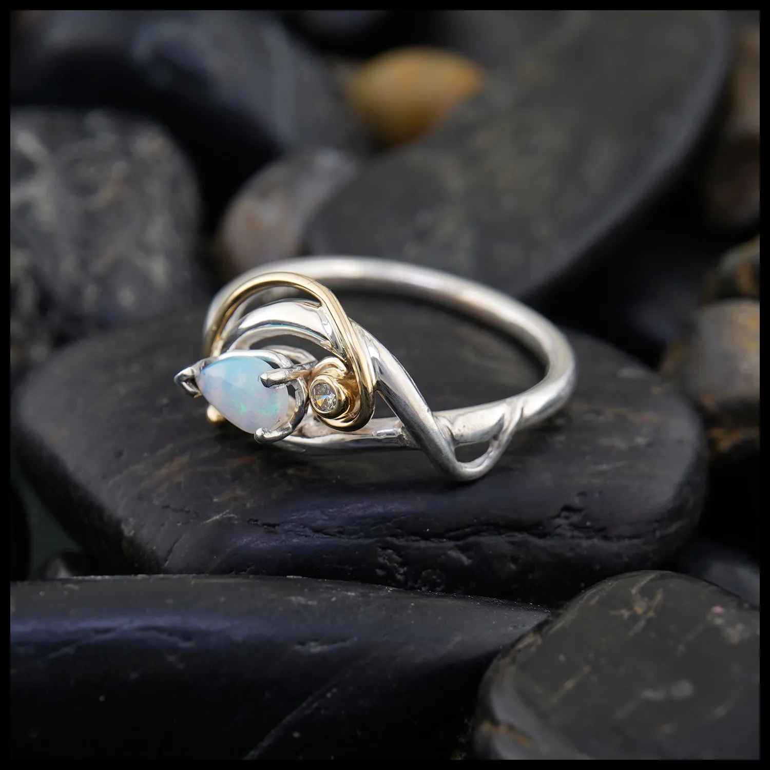 Elegant Diamond and Opal Ring