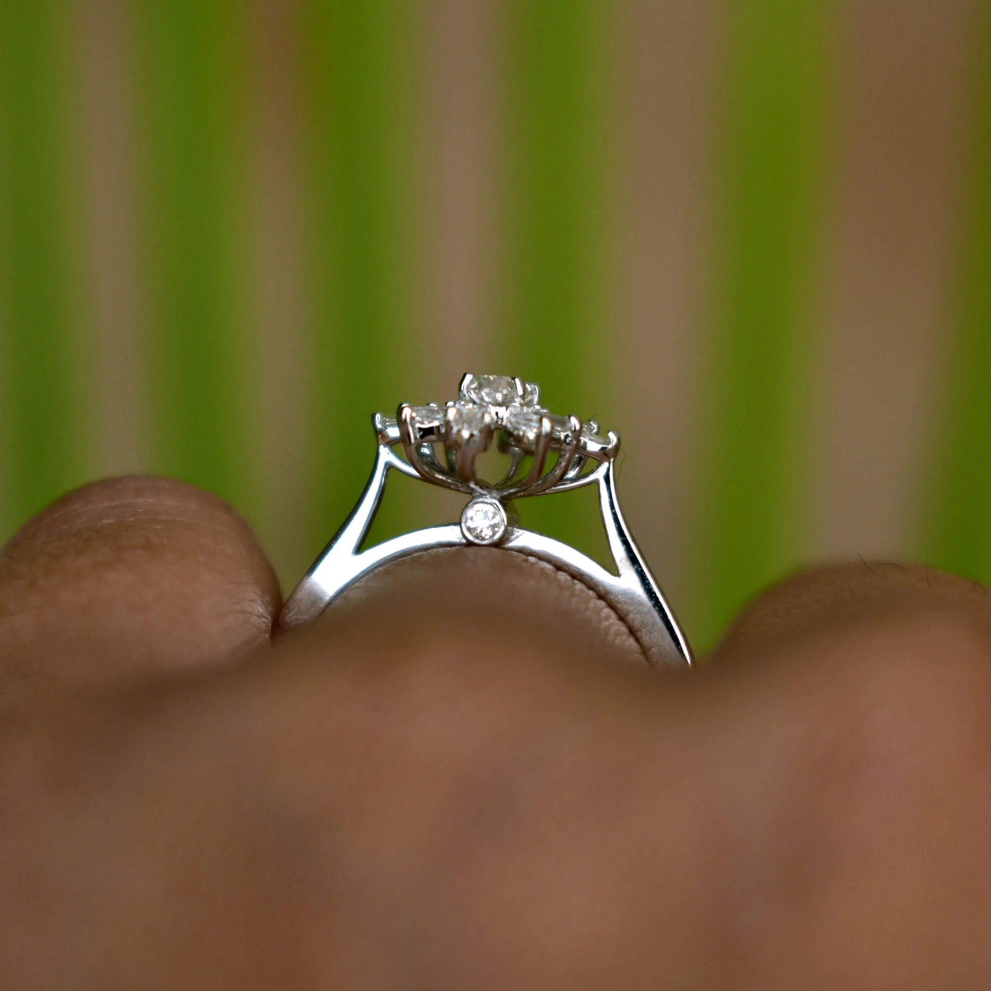 Oval Diamond Engagement Ring with Fancy Cut Diamond Halo