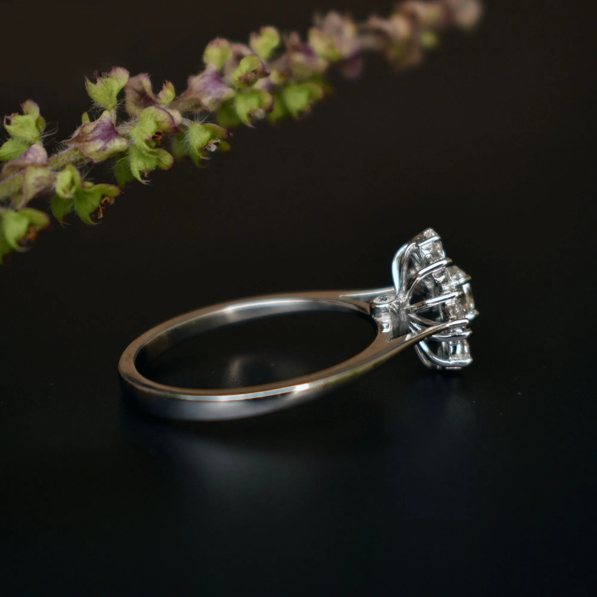 Oval Diamond Engagement Ring with Fancy Cut Diamond Halo