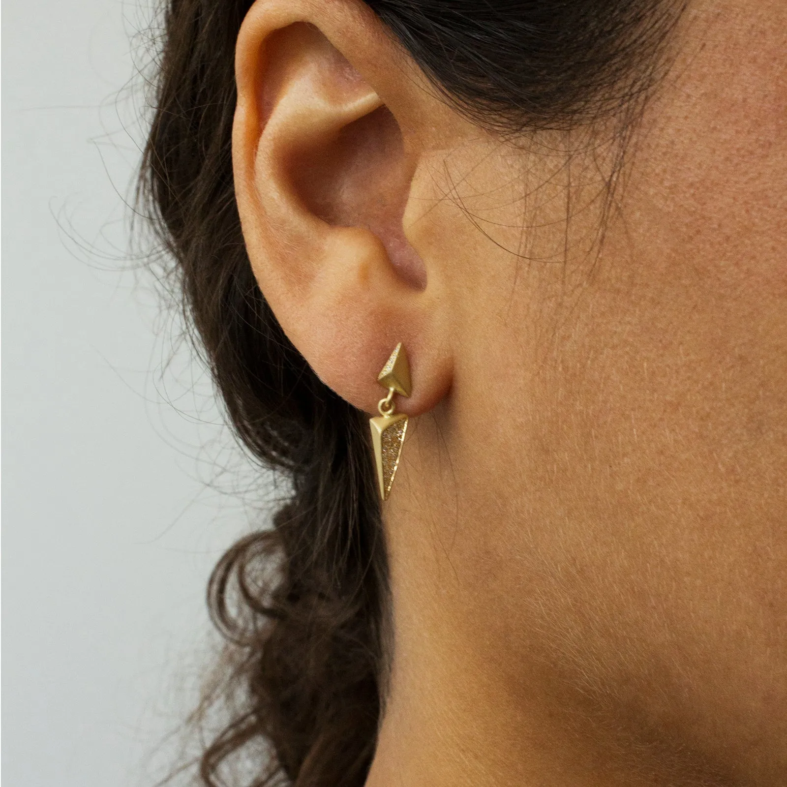 torque pavé dangle earrings
